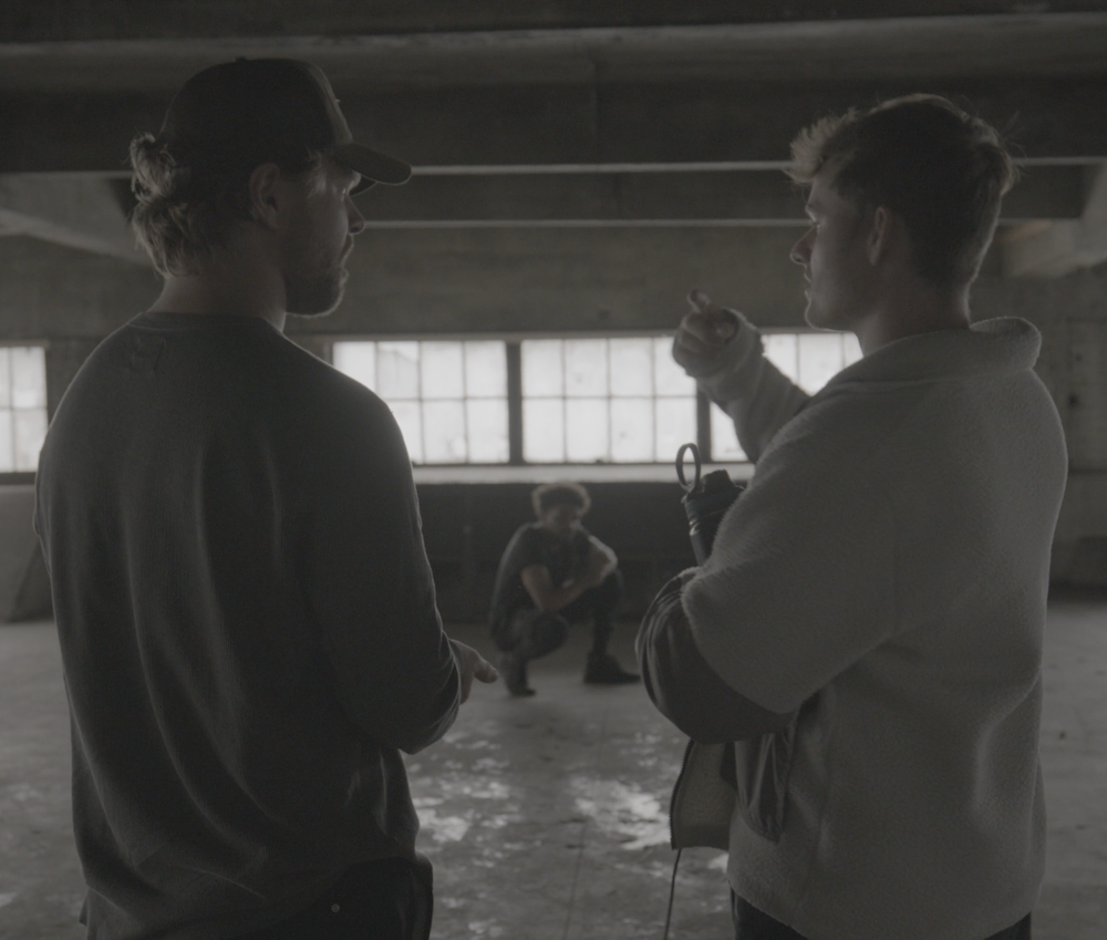 Nick Dean and Mitchell Mullins collaborating on a scene from their spec ad "Carry Us."